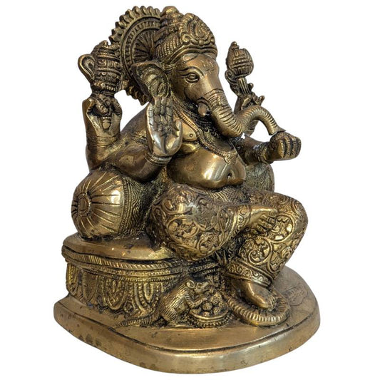 Vierarmige Ganesha-Figur aus Nepal mit ungewöhnlich kompakter, schwerer Gussmasse