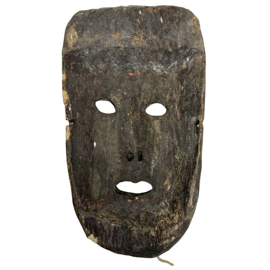 Nepalesische Holzmaske mit heiterem Ausdruck und gealterter Patina