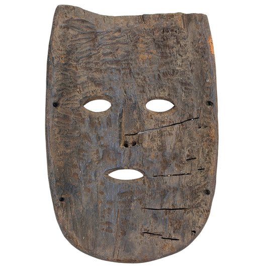 Rückseite der nepalesischen Holzmaske mit alten Befestigungslöchern und Gebrauchsspuren