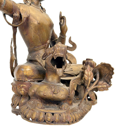 Detail des Gesichts und der hohen Krone des nepalesischen Mañjuśrī