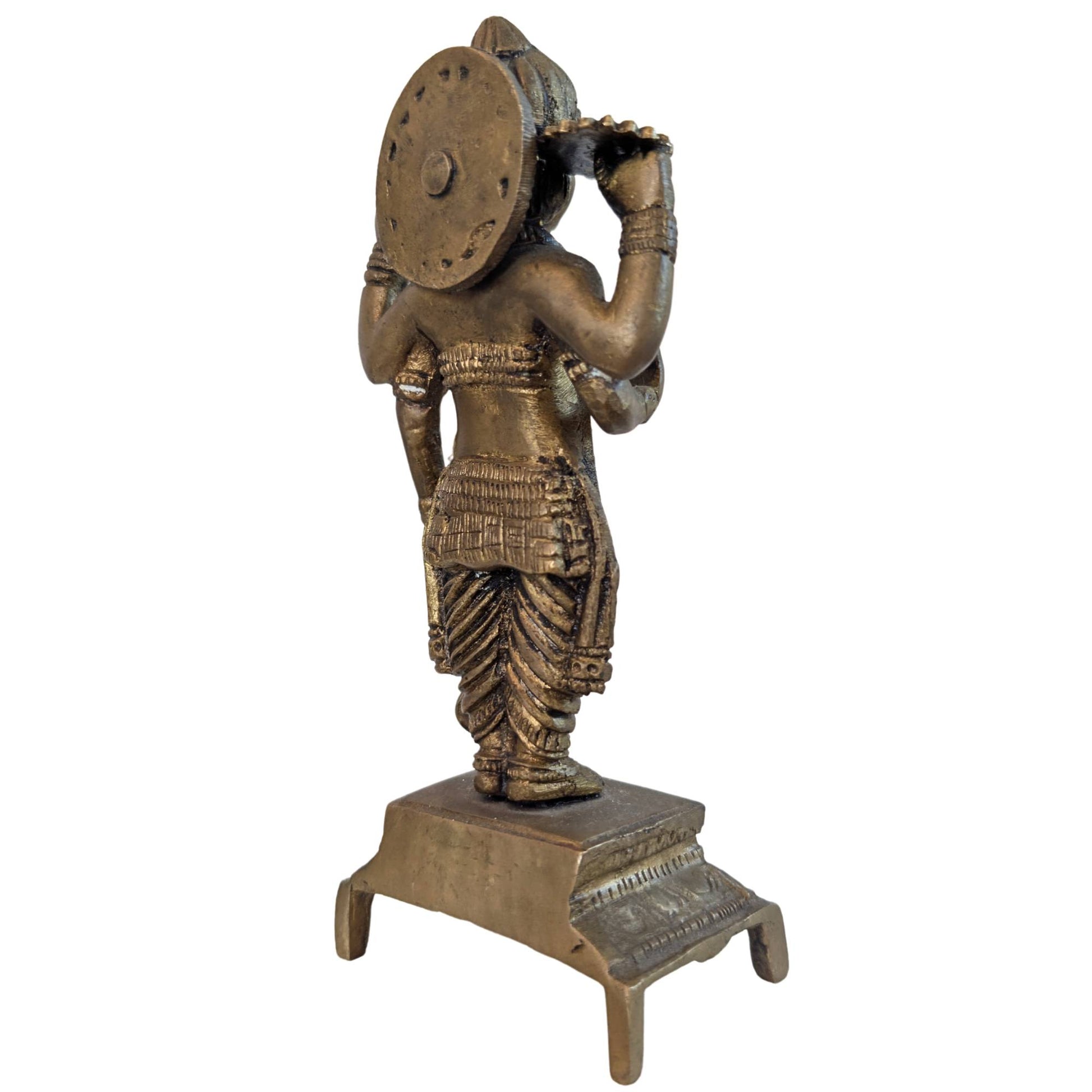 Rückseite einer antiken Vishnu-Statue mit Spuren alter Feuervergoldung und Patina