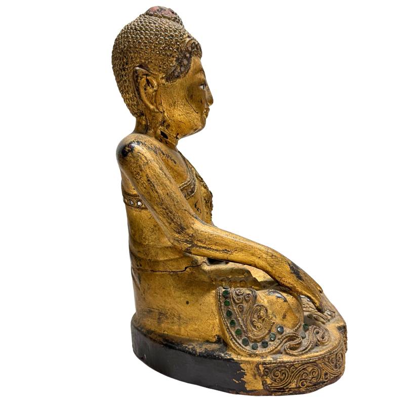 Seitenansicht einer burmesischen Buddha-Büste aus dem 19. Jahrhundert, gefertigt aus tropischem Teakholz – exklusive Tempelkunst und eine solide Investition.