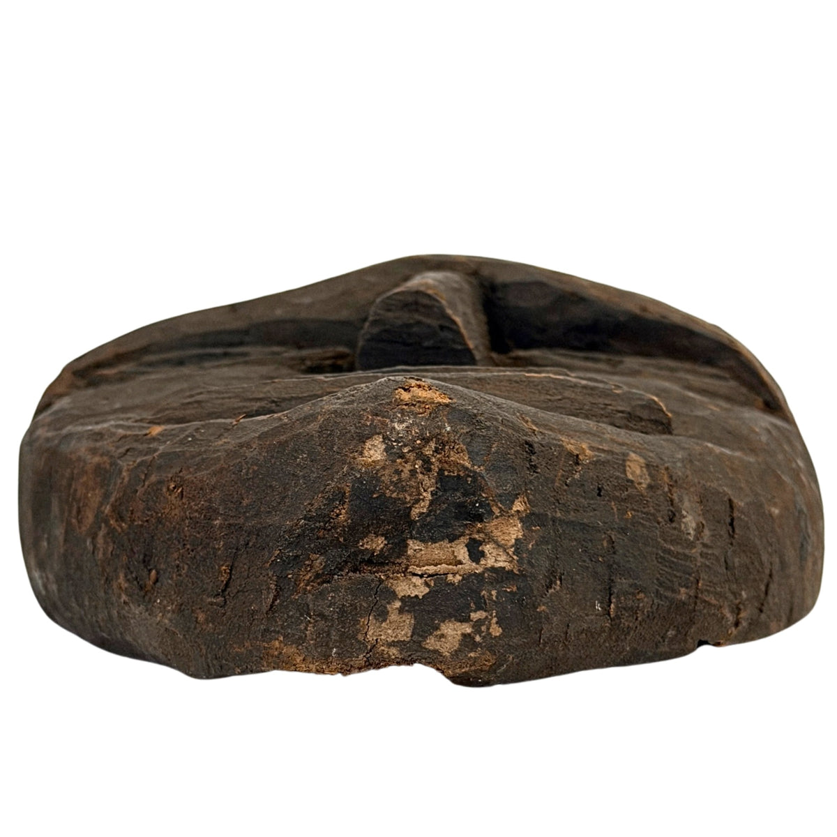 Underside of the antique Nepalese shamanic mask with old wear and dark patina