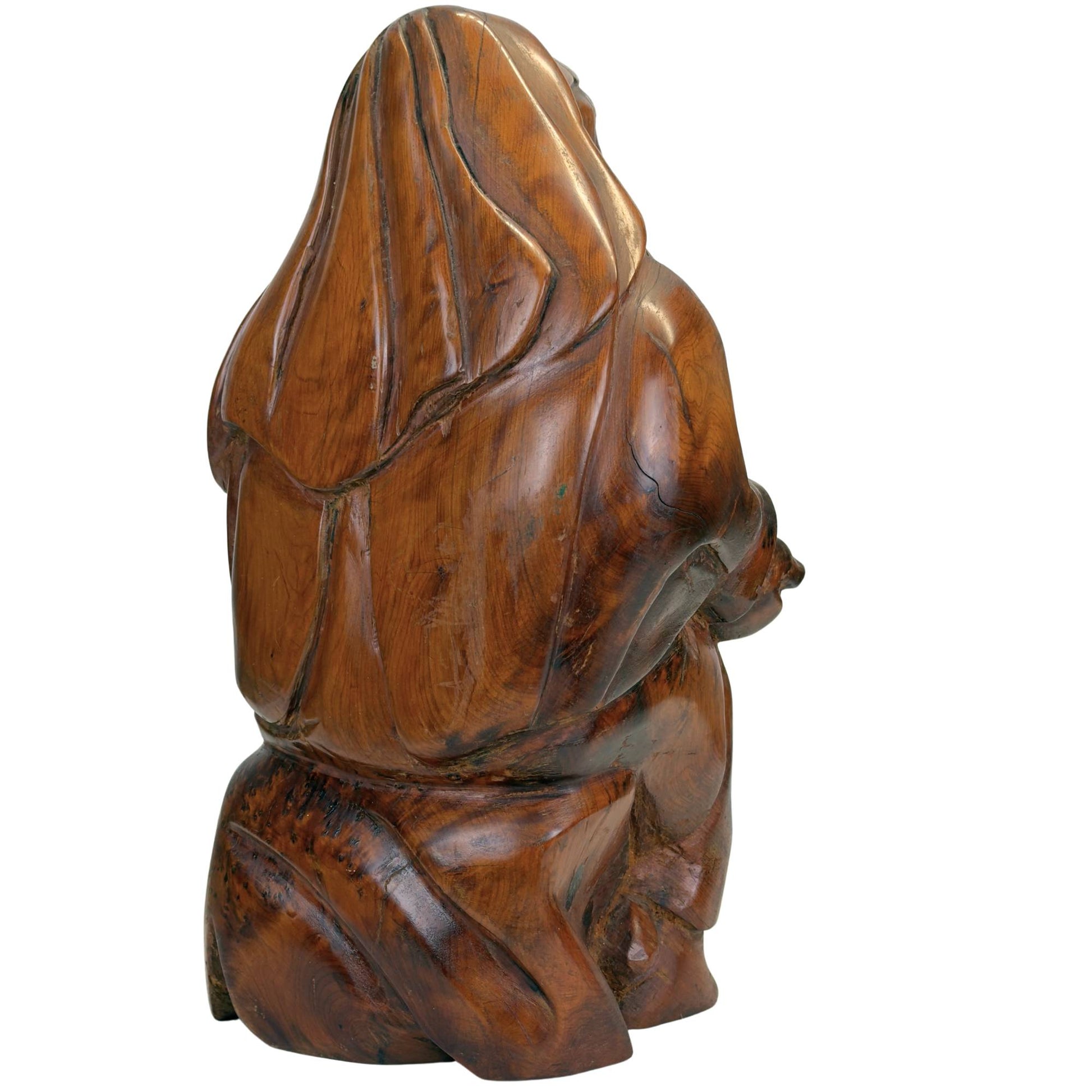 Antike religiöse Holzstatue, die Mutterschaft und Hingabe darstellt
