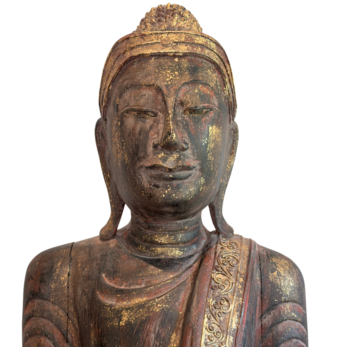Detail of the face of an antique Burmese Buddha