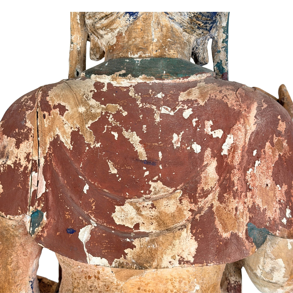 Detail des Kopfschmucks und der alten blau-grünen Polychromie