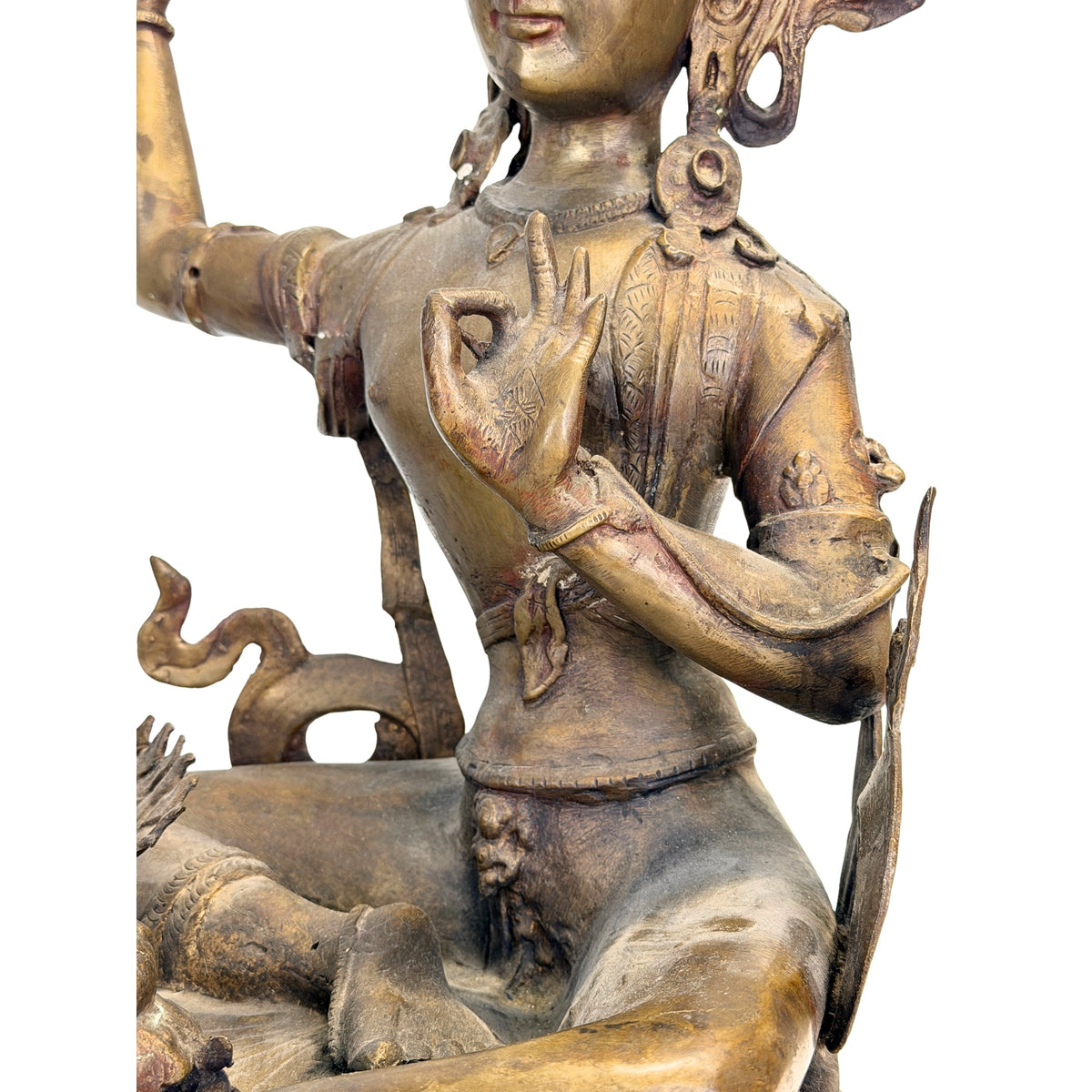 Antieke Nepalese Manjushri – detail van de hand voor de borst, het gewaad en de schoot