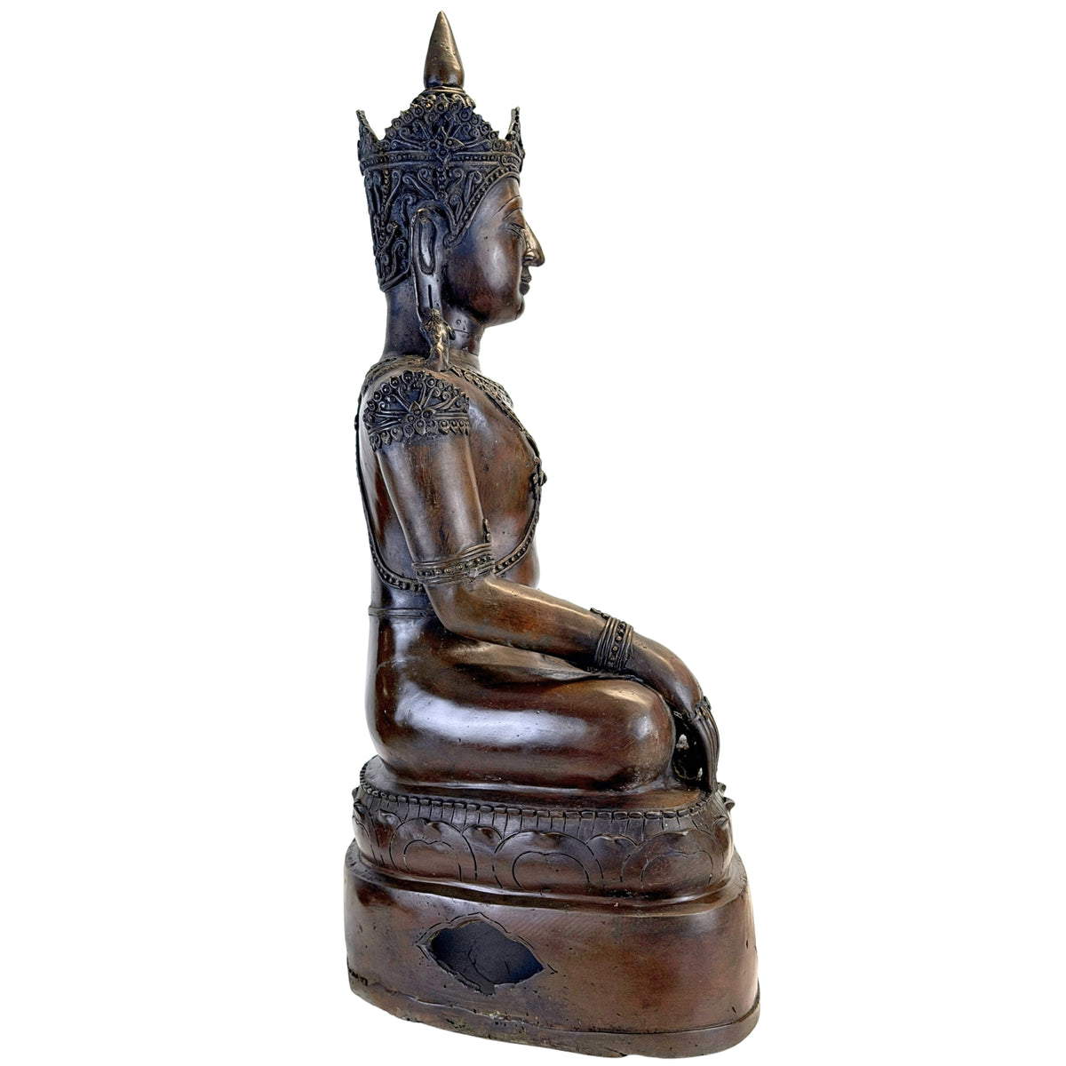 Full left side view of the antique Thai crowned Buddha