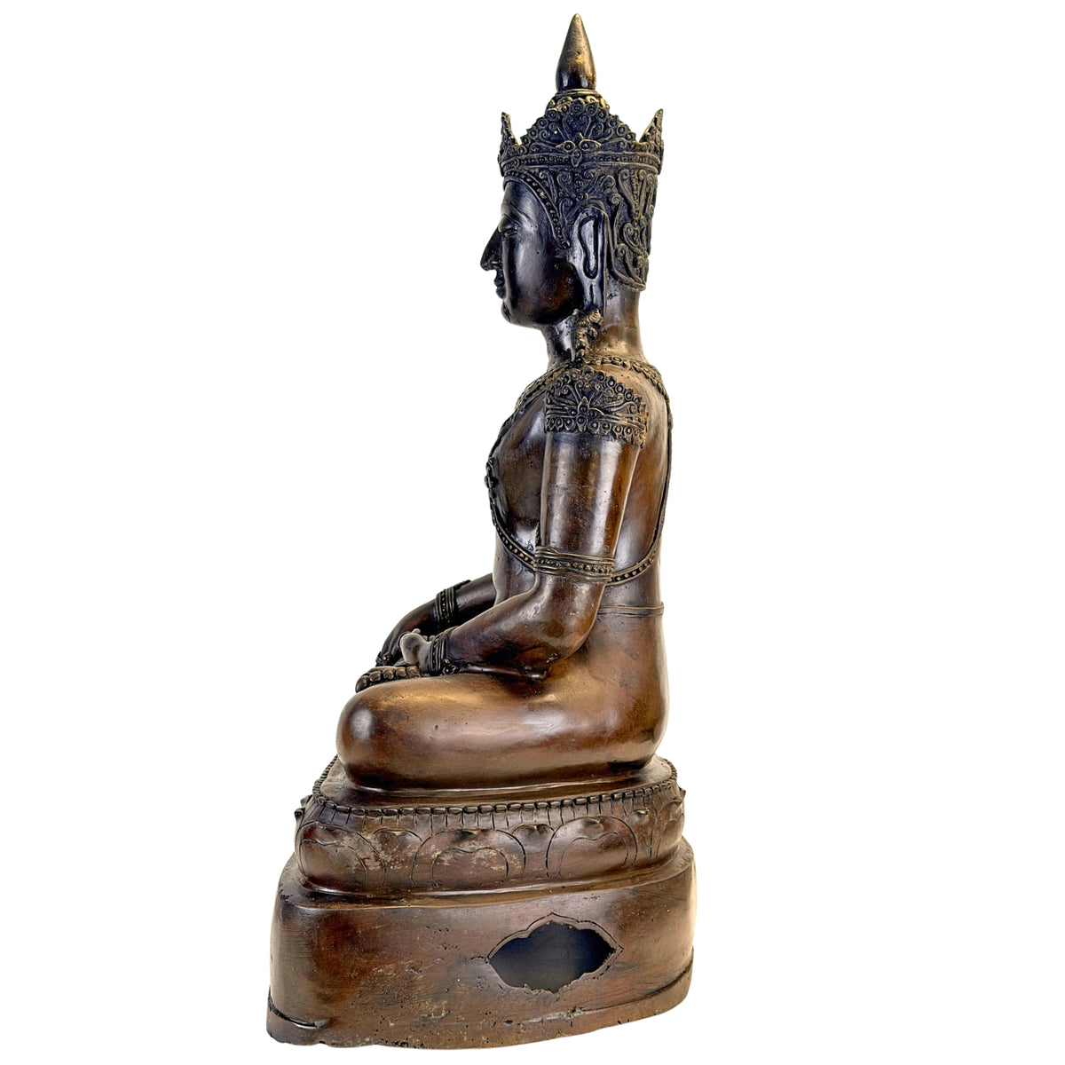 Full right side view of the antique Thai crowned Buddha