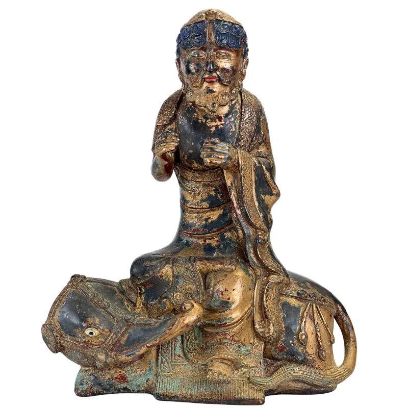 Arhat sitzt auf einem Dano-Tier in bronzener Himalaya-Statue