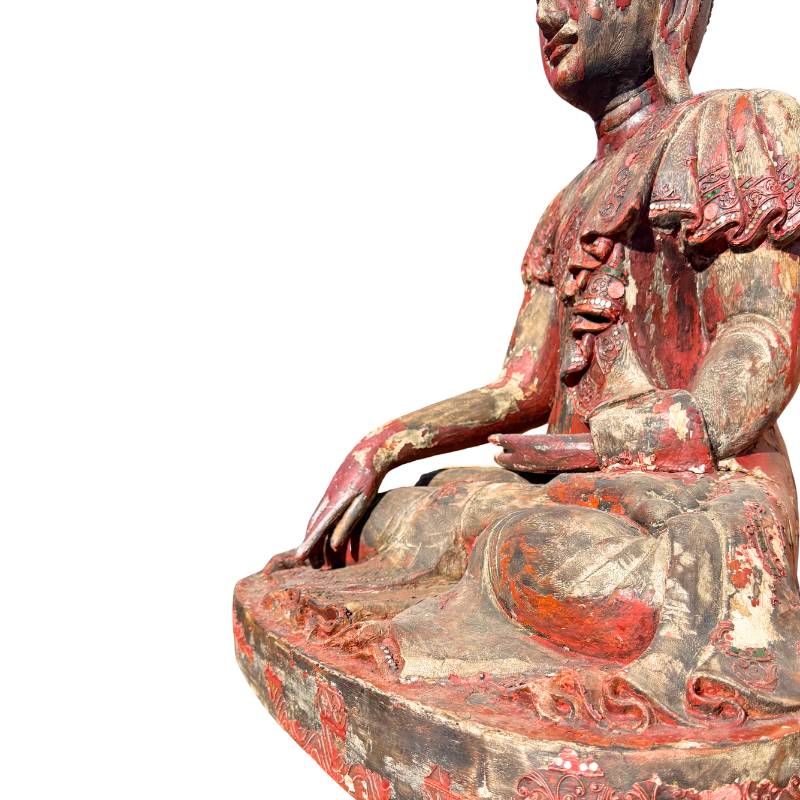Buddha-Statue aus Holz, gefertigt in einer burmesischen Tempelanlage.

Holzimitat aus der Tradition burmesischer