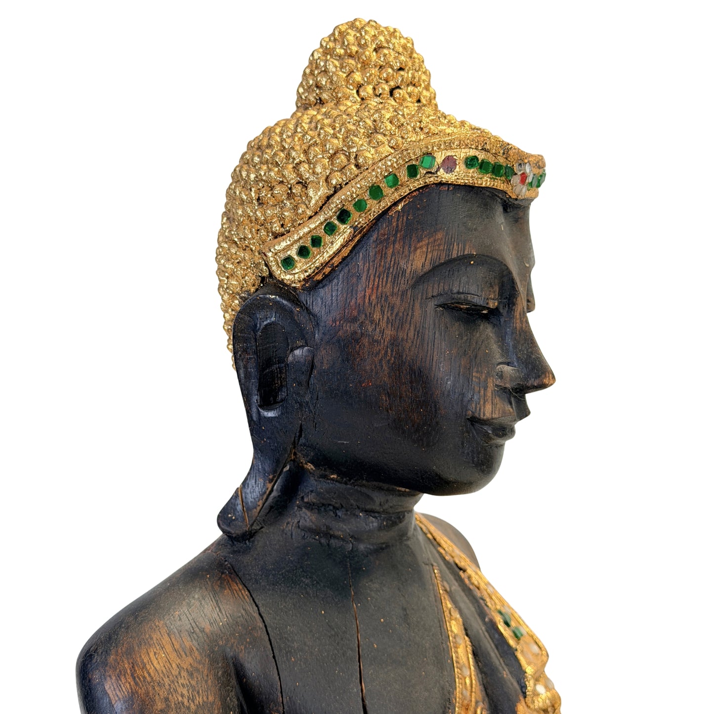 Profil des Gesichts des schwarz lackierten birmanischen Buddha