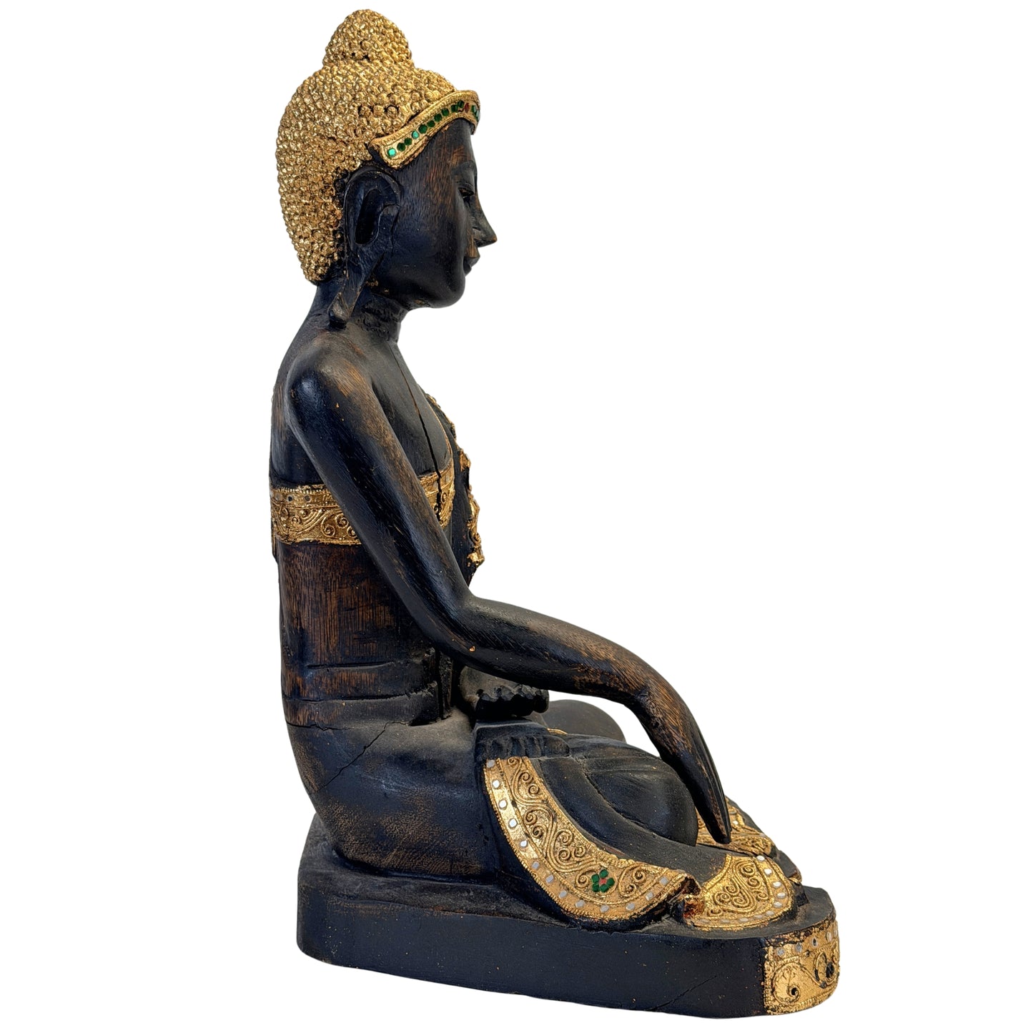Detail der vergoldeten Haare und grünen Spiegelglaseinlage des Buddha