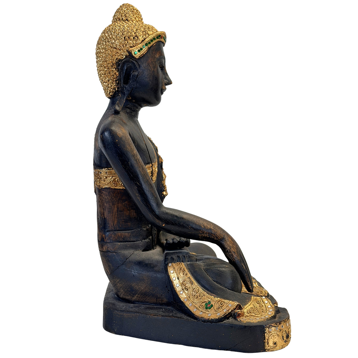 Detail der vergoldeten Haare und grünen Spiegelglaseinlage des Buddha