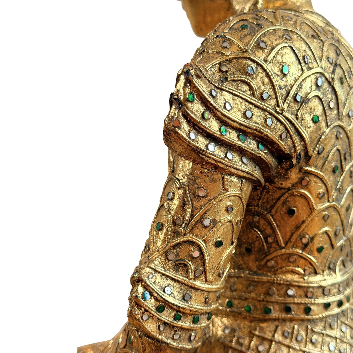 Detail der linken Schulter und des Oberarms mit Glaseinlagen