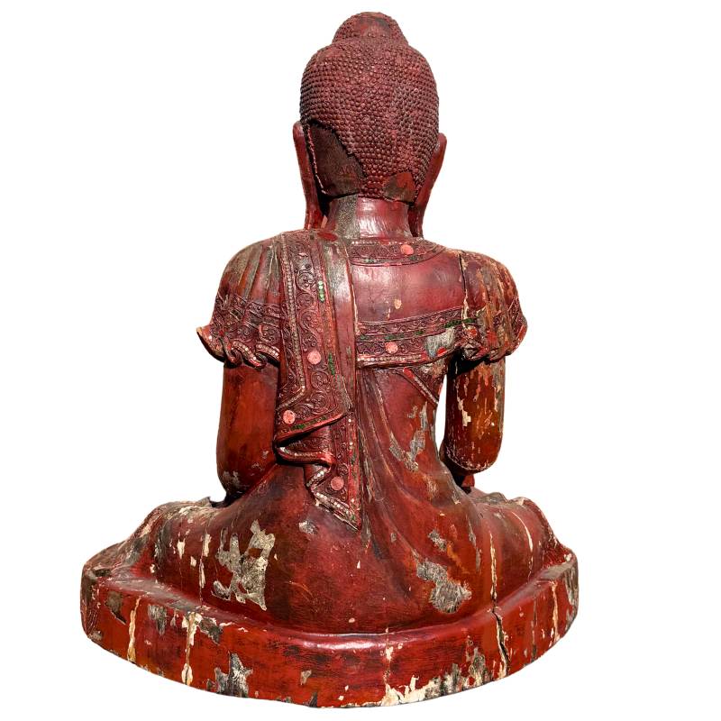Buddha-Skulptur aus Holz, ein Beispiel burmesischer Tempelkunst


Hinter der Fassade eines Buddhas aus der bur