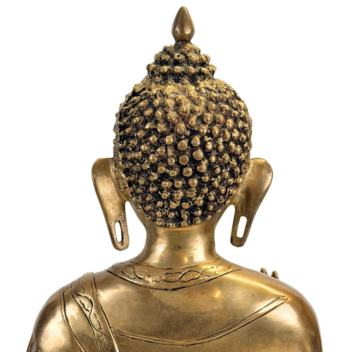 Rückseite des Buddha-Kopfes mit stilisierten bronzenen Haarlocken.