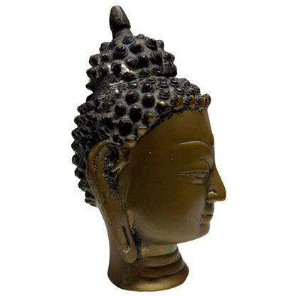 Vorindustrieller feuervergoldeter Buddha‑Kopf aus Nepal mit sichtbarem Alter und Verschleiß