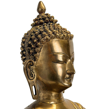 Das Profil des Haupts des antiken bronzen Buddha.