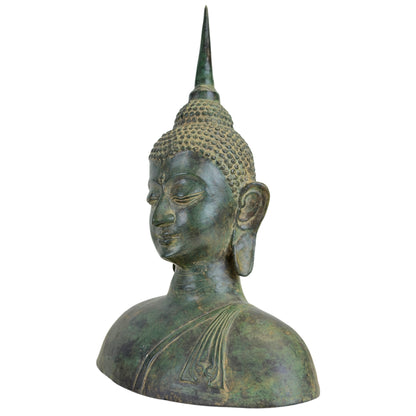 Detail des Gesichts einer bronzenen Buddha-Statue aus Thailand im Sukhothai-Stil.