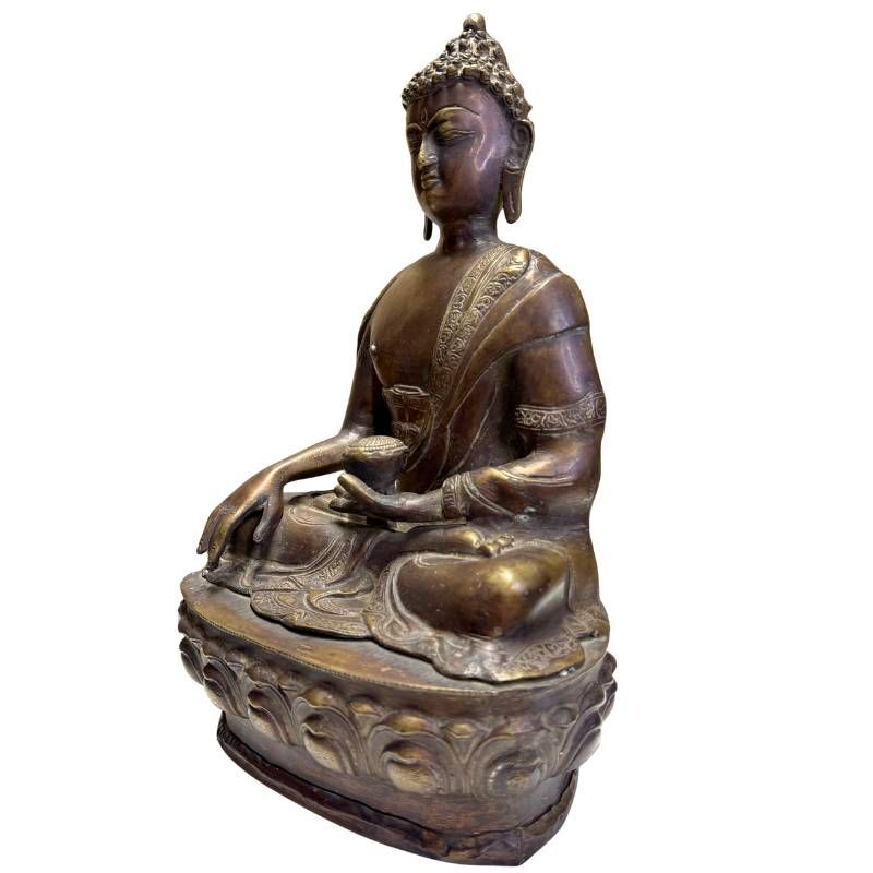 Seitenansicht eines antiken Medizinbuddhas aus Bronze aus der Himalaya-Tradition