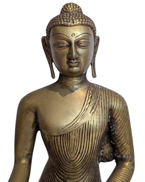 Bronzene Shakyamuni-Buddha-Statue mit Elefantensockel in Erdberührungsgeste.