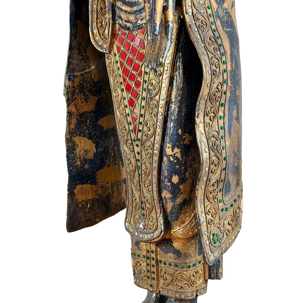 Detail van linkerhand en rode spiegelinleg