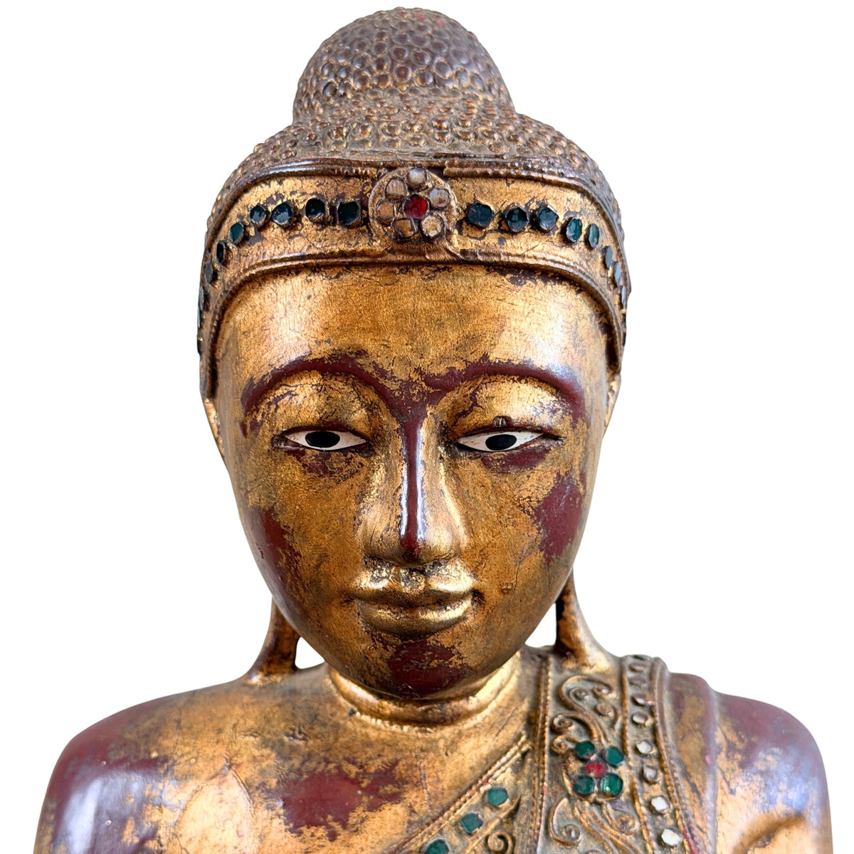 Detail des vergoldeten Gesichts mit eingelegten Augen und Stirnband