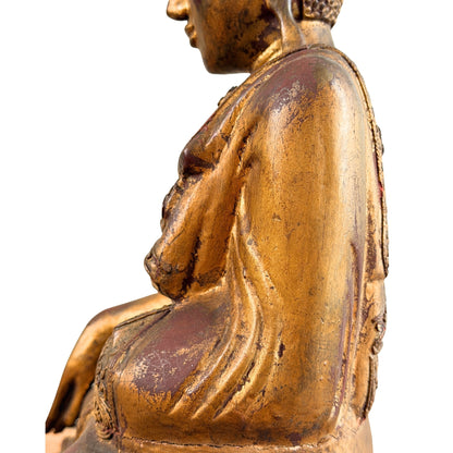 Nahaufnahme des Buddha-Kopfes mit eingelegten Augen und Stirnband