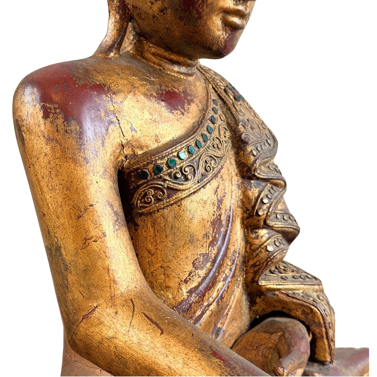 Detail von Schulter und Gewand mit vergoldeter Dekoration und Glaseinlagen