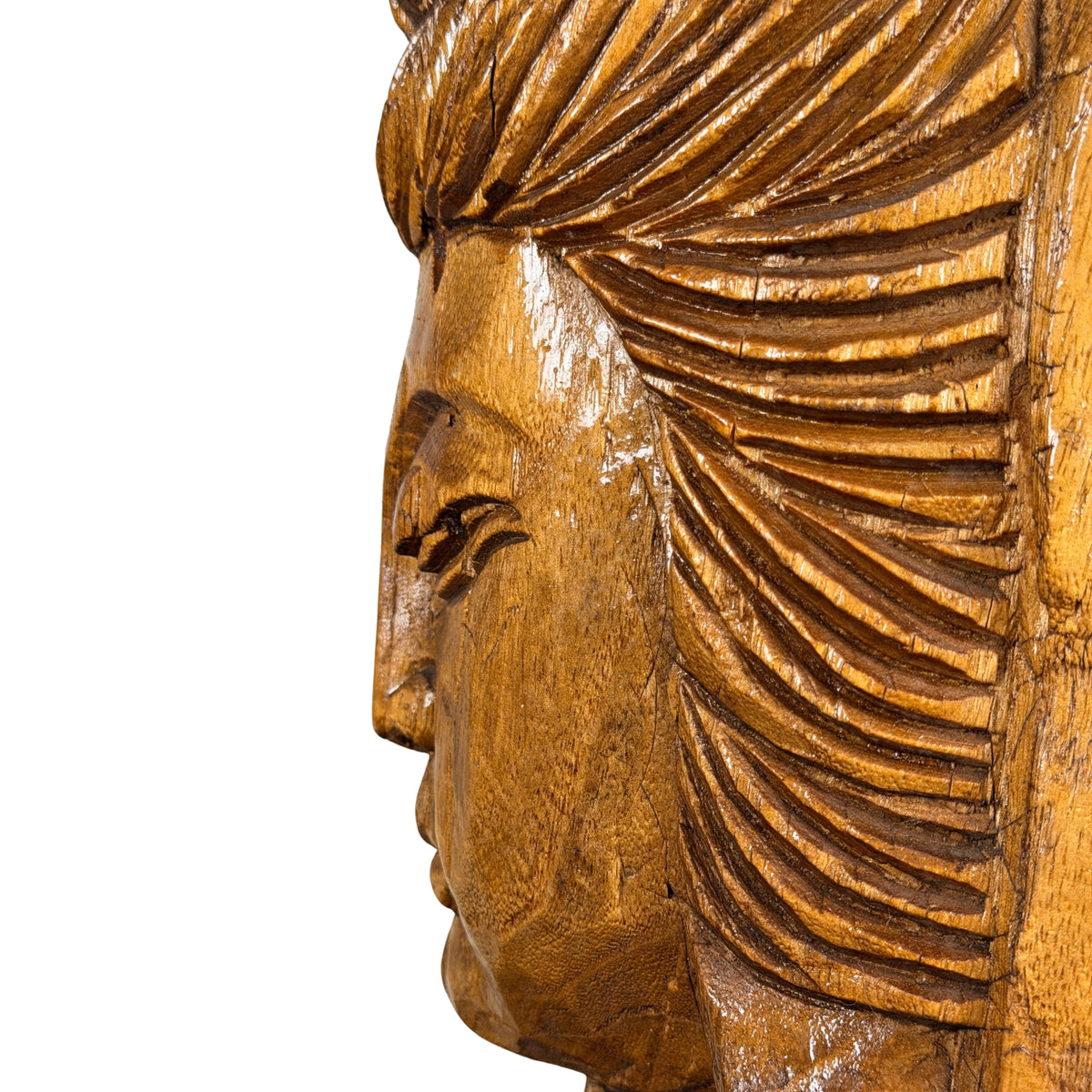 Lange geschnitzte Haarsträhnen neben dem Gesicht der Guanyin