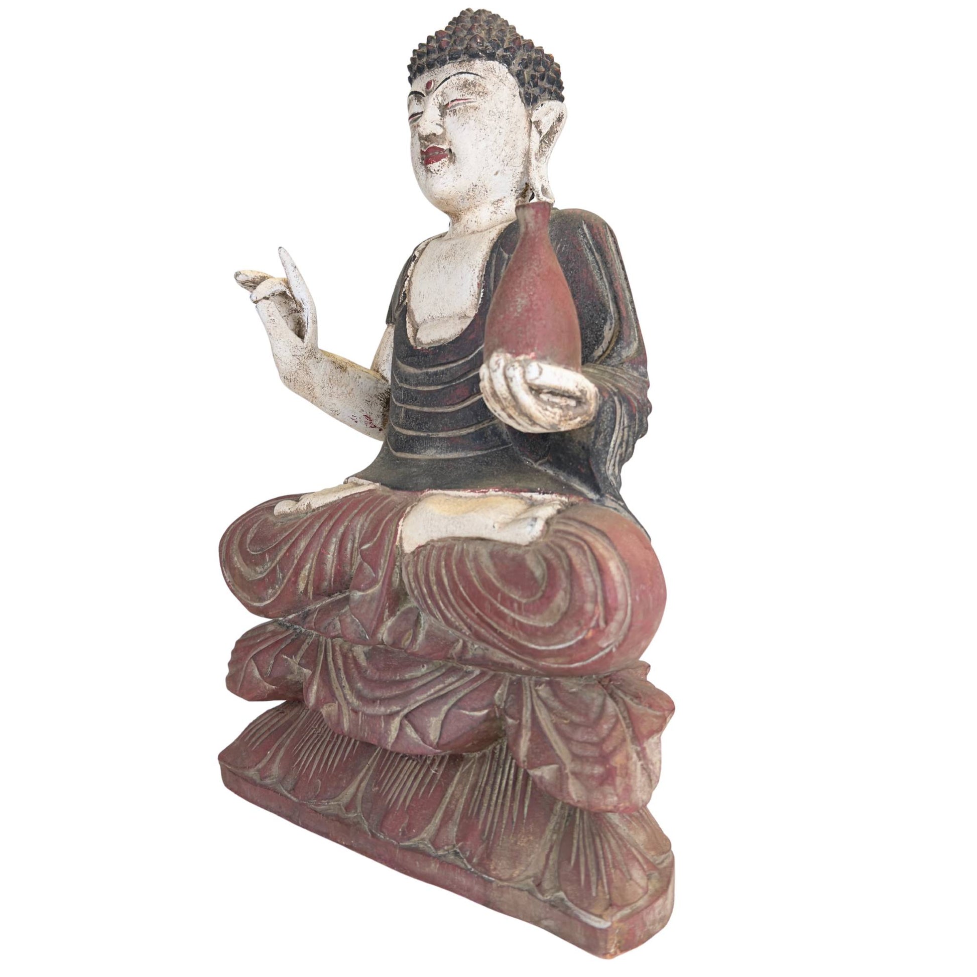 Detail des Gesichts eines Buddha der chinesischen Medizin mit geschlossenen Augen, weißer Bemalung und ruhigem, meditativem Ausdruck
