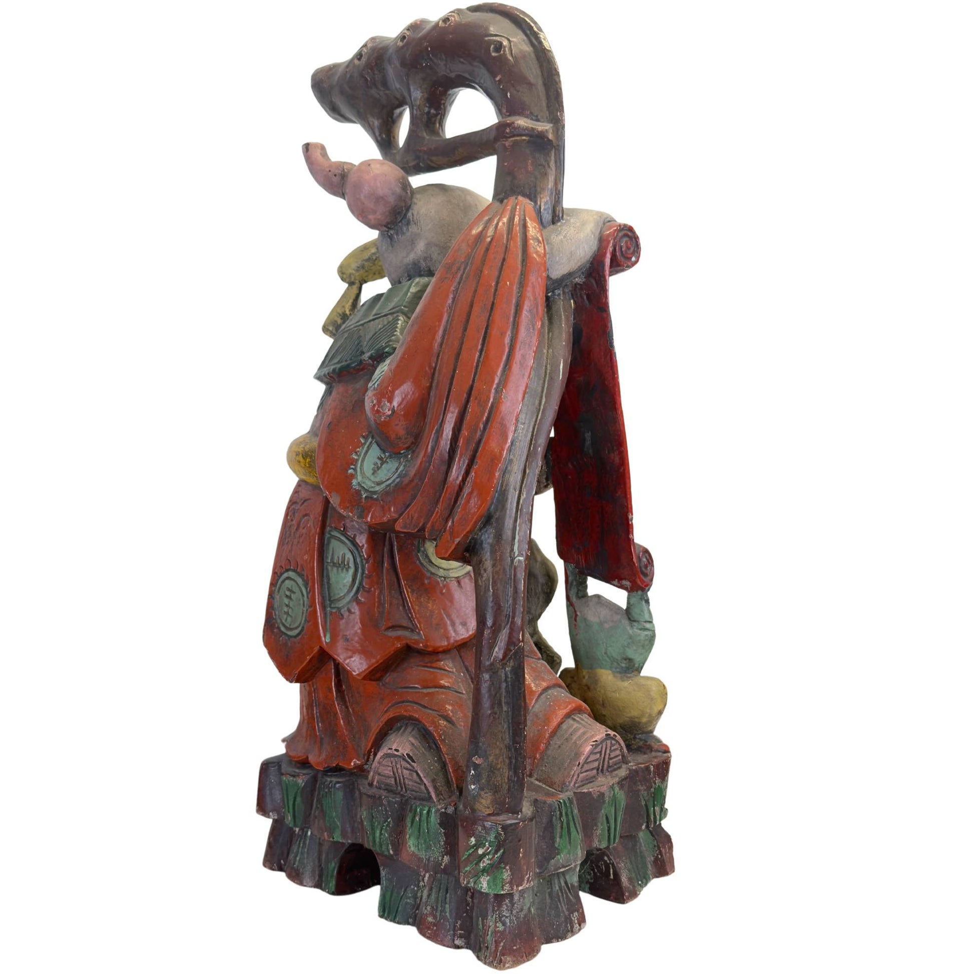 Rückansicht der Shoulao-Skulptur, in der die Tiefe und Komplexität der Holzschnitzerei auf der Rückseite deutlich sichtbar sind.