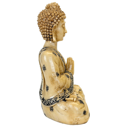 Sitzender Buddha aus Kunstharz mit schwarzen floralen Details – Seitenansicht