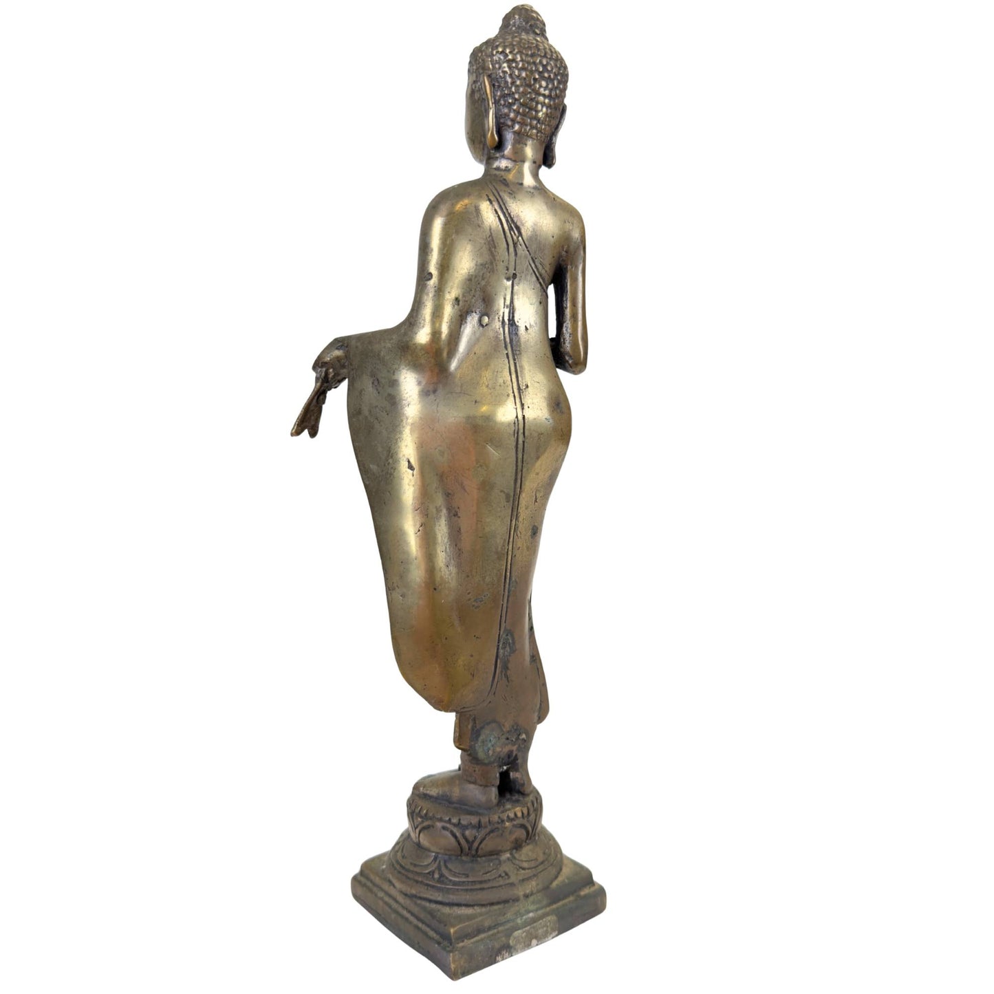 Nahaufnahme des gelassenen Gesichtsausdrucks einer antiken Buddha-Statue aus Bronze.
