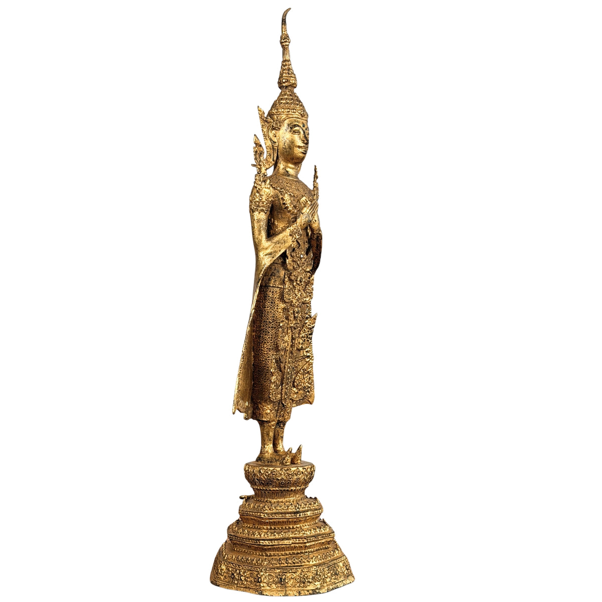 Three-quarter front view of the Buddha on its lotus base