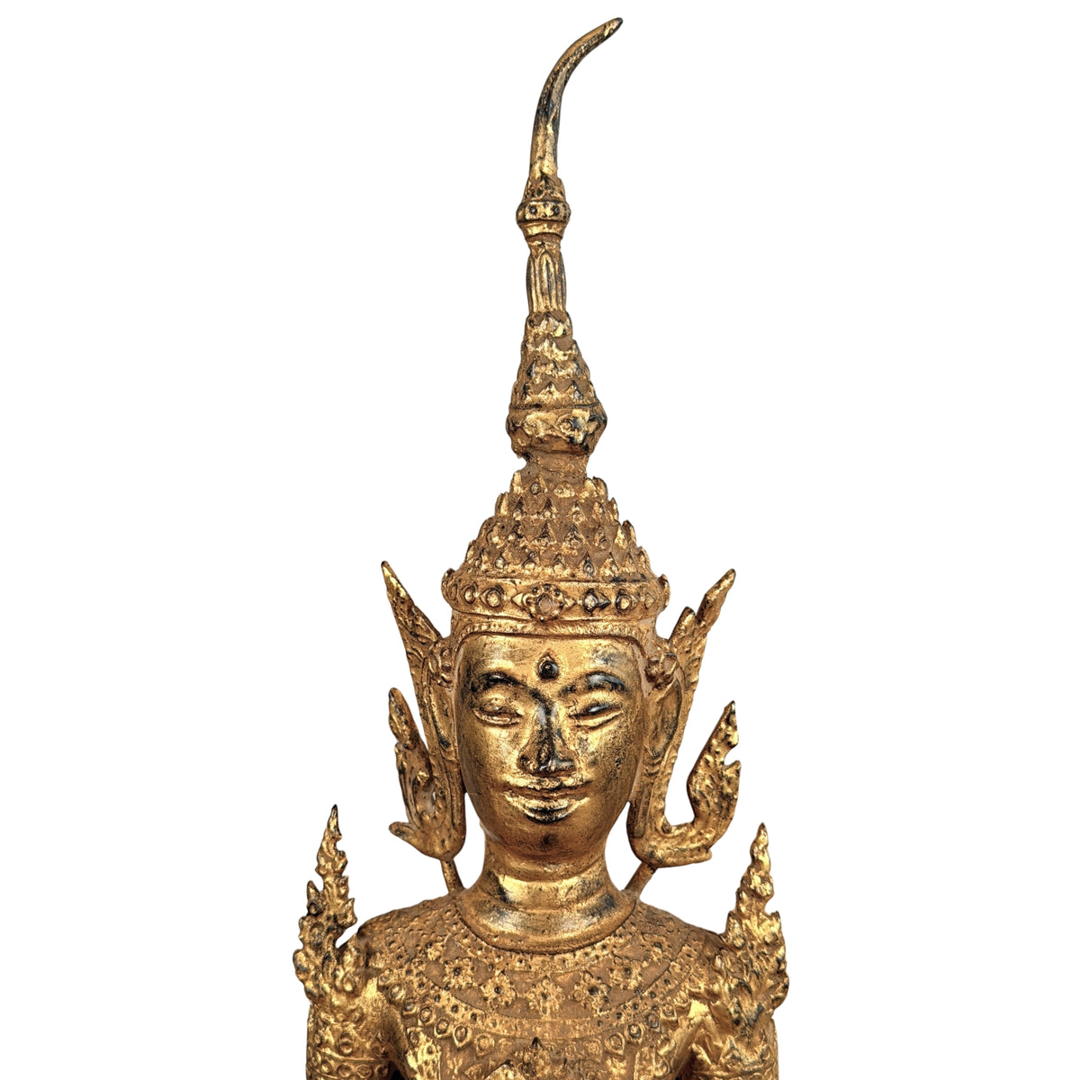 Face beneath the tall crown with flame, detail