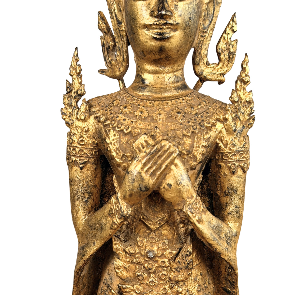 Hands held at the chest and the chest ornament, detail