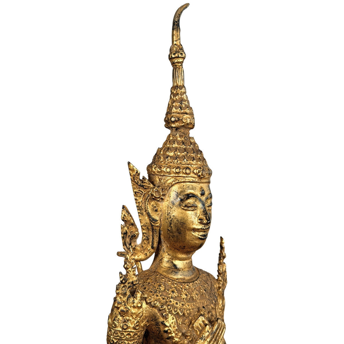 Tall crown with flame and face, three-quarter view, detail