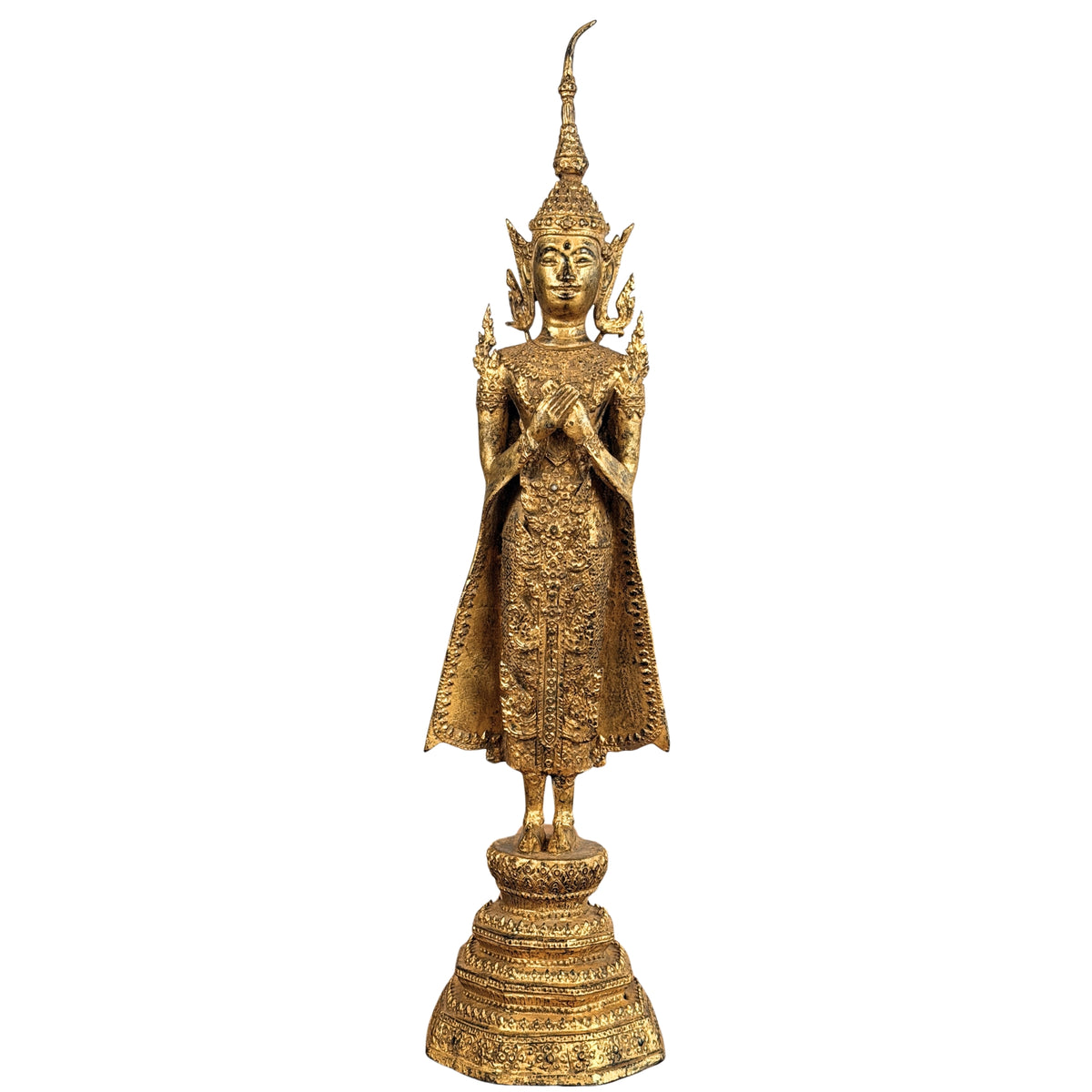 Crowned standing Buddha in royal attire, gilt bronze, on a stepped lotus base, front view