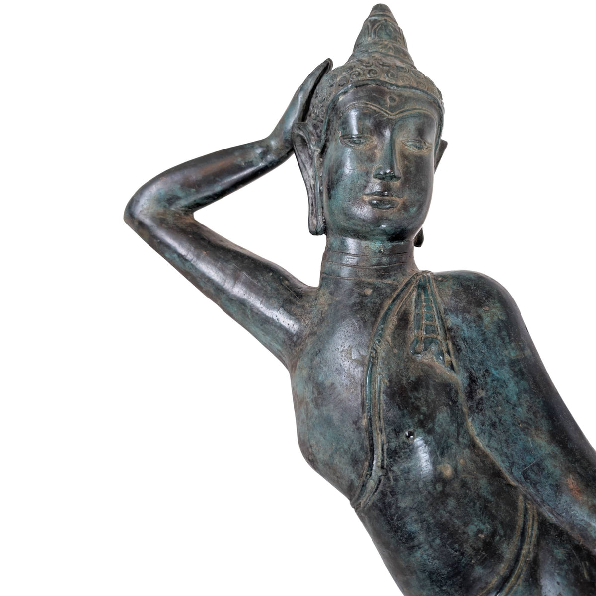 Detail of the face of a Thai Buddha with visible remnants of gilding and patina