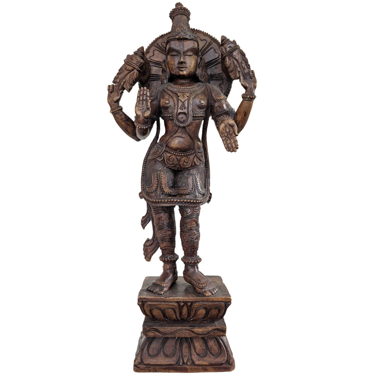 Large hand‑carved wooden statue of Lord Vishnu from South India.