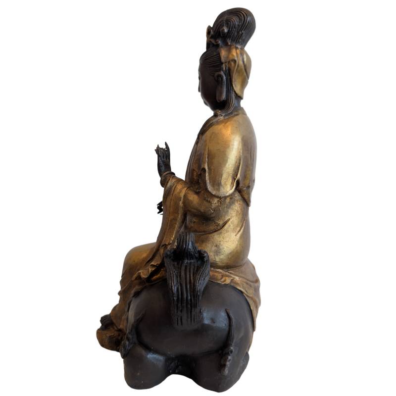 Guanyin mit Löwe in der chinesischen Ikonographie