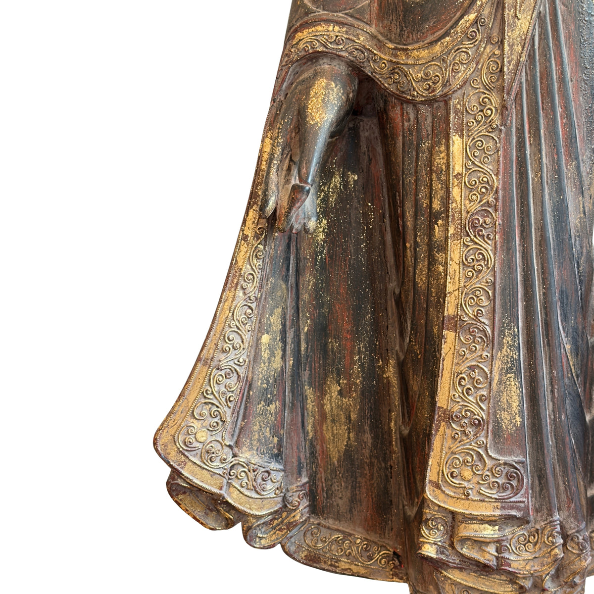 Hand-carved fabric decoration of an antique Burmese Buddha