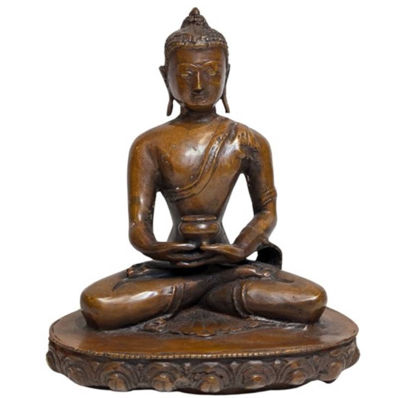Detail des Gesichts mit Restvergoldung an einer Buddha-Statue aus Himalaya-Bronze in Dhyana-Mudra, 17. Jahrhundert