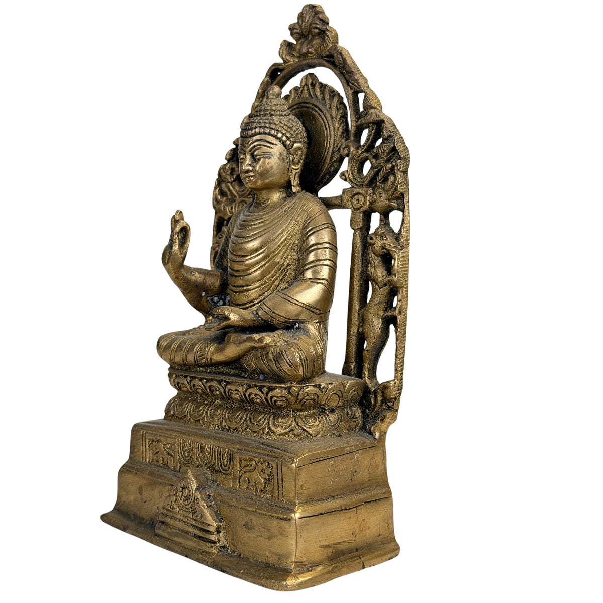 Indische Altarfigur auf Lotusthron mit Makara- und Yali-Motiven im Torbogen