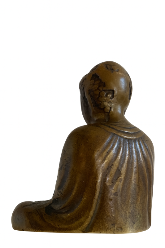 Detail einer japanischen Buddha-Statue aus Bronze in Meditationshaltung