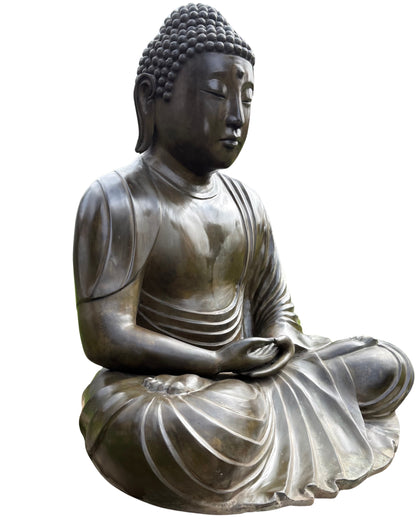Gesicht von japanischem Kamakura‑Stil Buddha mit alter bronzener Patina