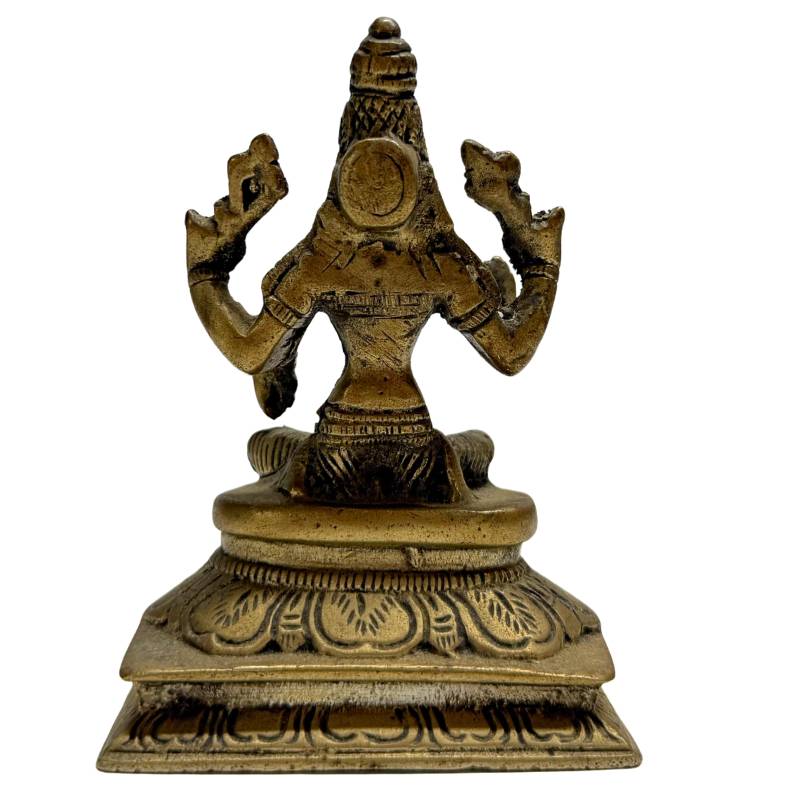 Bronzestatue der Lakshmi in Lotussitzposition auf einem reich verzierten Thron


Lakshmi-Statue aus Bronze in Lotussitzposition auf einem reich verzierten Thron


Lak ...