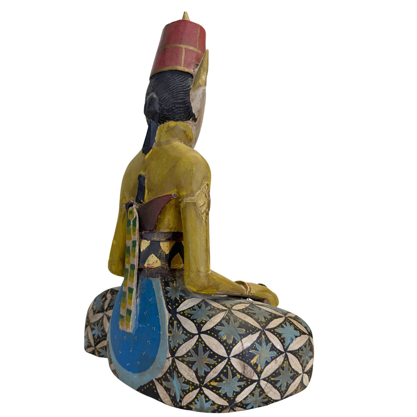 Männliche Loro Blonyo-Figur mit traditionellem Kuluk und Kris auf dem Rücken.